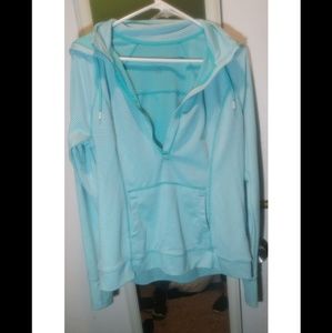 Tangerine half zippered light blue hoodie